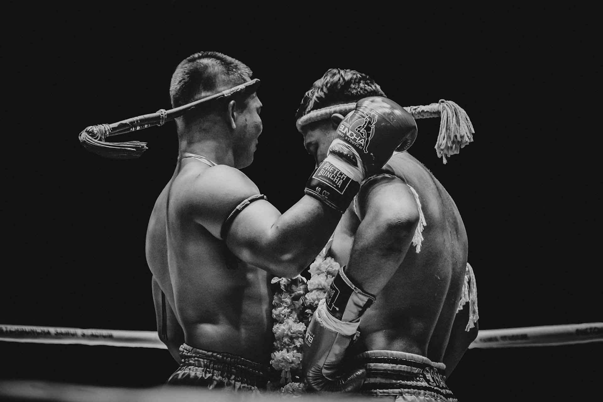 Thai boxers hugging